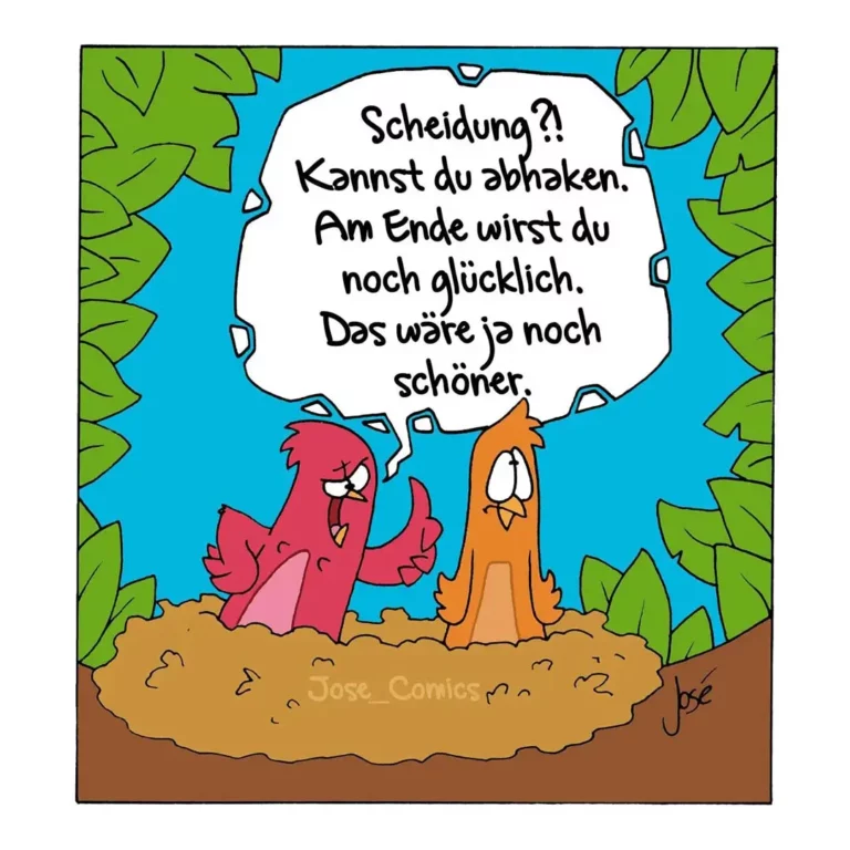 Roter Vogel spricht zu orangegelbem Vogel in einer sandigen Landschaft, umgeben von grünem Laub