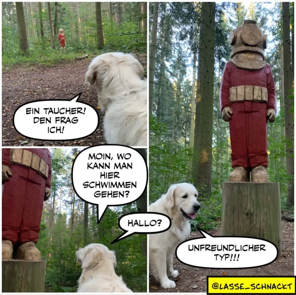 Weisser Hund trifft im Wald auf eine rote Holzfigur und fragt sie, ob sie schwimmen gehen können